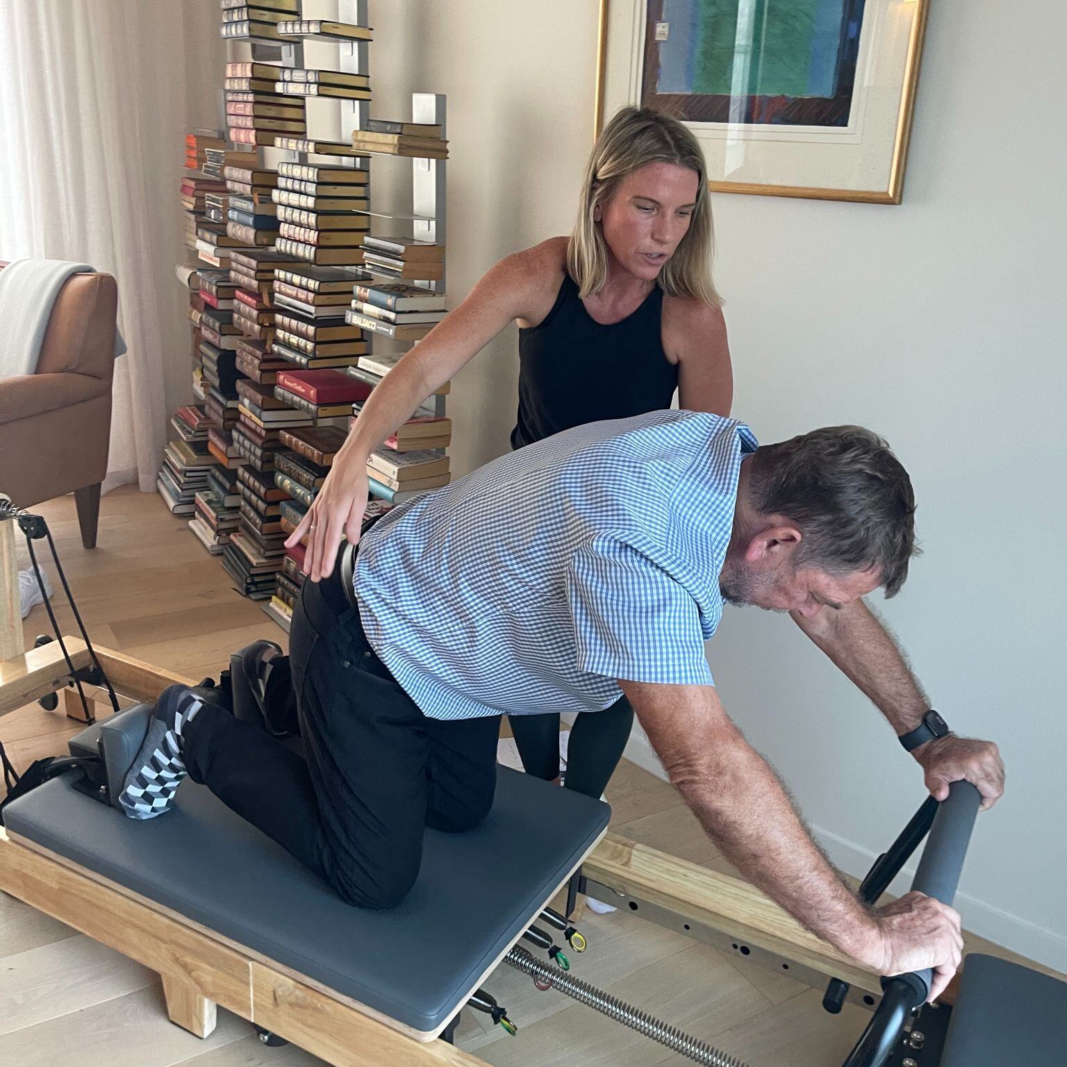 Graham Turner on his Reformer Pilates machine